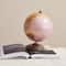 Hello Honey® 10.75" Pink & Gold Metal & Plastic Globe on Natural Mango Wood Stand